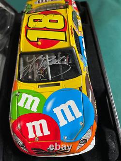 2009 1/24 Action M & M's Elite Kyle Busch Autographed Nascar Diecast # 261/700