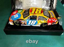 2009 1/24 Action M & M's Elite Kyle Busch Autographed Nascar Diecast # 261/700