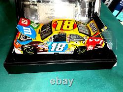 2009 1/24 Action M & M's Elite Kyle Busch Autographed Nascar Diecast # 261/700