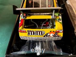 2009 1/24 Action M & M's Elite Kyle Busch Autographed Nascar Diecast # 261/700