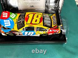 2009 1/24 Action M & M's Elite Kyle Busch Autographed Nascar Diecast # 261/700