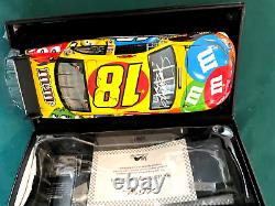 2009 1/24 Action M & M's Elite Kyle Busch Autographed Nascar Diecast # 261/700