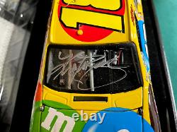 2009 1/24 Action M & M's Elite Kyle Busch Autographed Nascar Diecast # 261/700