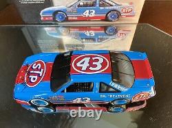 Richard Petty #43 STP Farewell Autographed 1992 Pontiac Grand Prix 124 Action