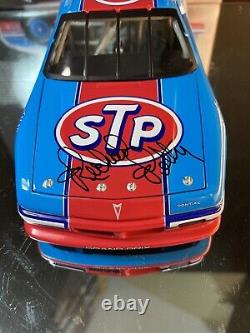 Richard Petty #43 STP Farewell Autographed 1992 Pontiac Grand Prix 124 Action